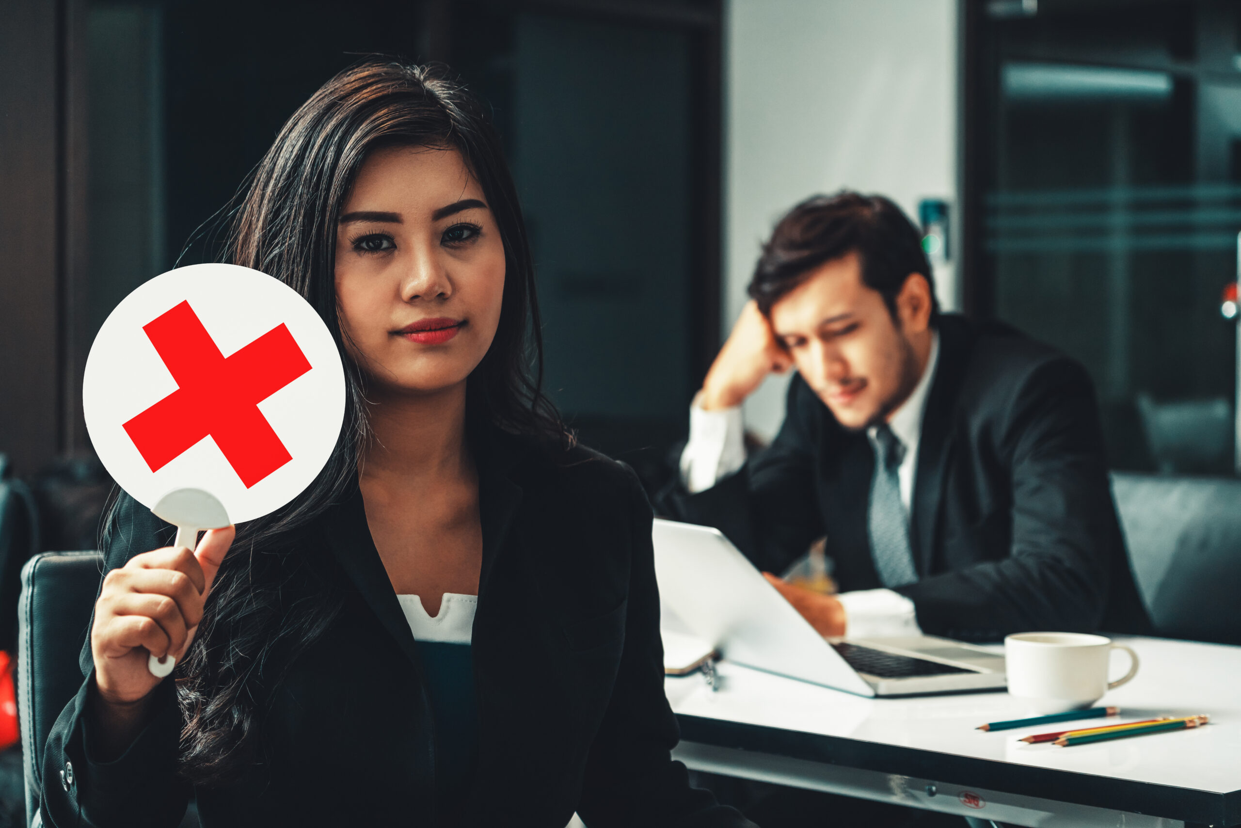 Female human resource manager decline the employment candidate who failed interviewing, sitting in office room. Reject job interview. Job application, recruitment and Asian labor hiring concept. uds